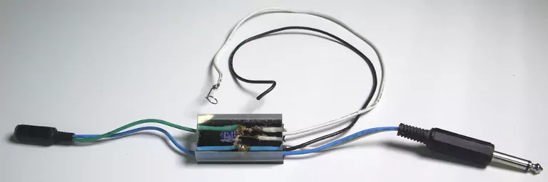 Image of the device encased in acrylic