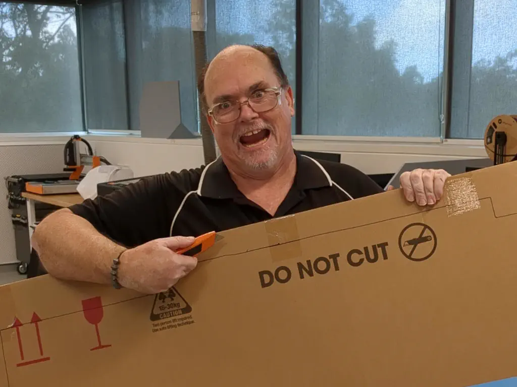 Glenn about to cut a 'don't cut' notice.
